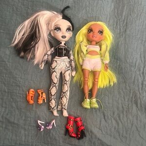 Fashionable Doll Pair with Black, White, and Neon Yellow Hair